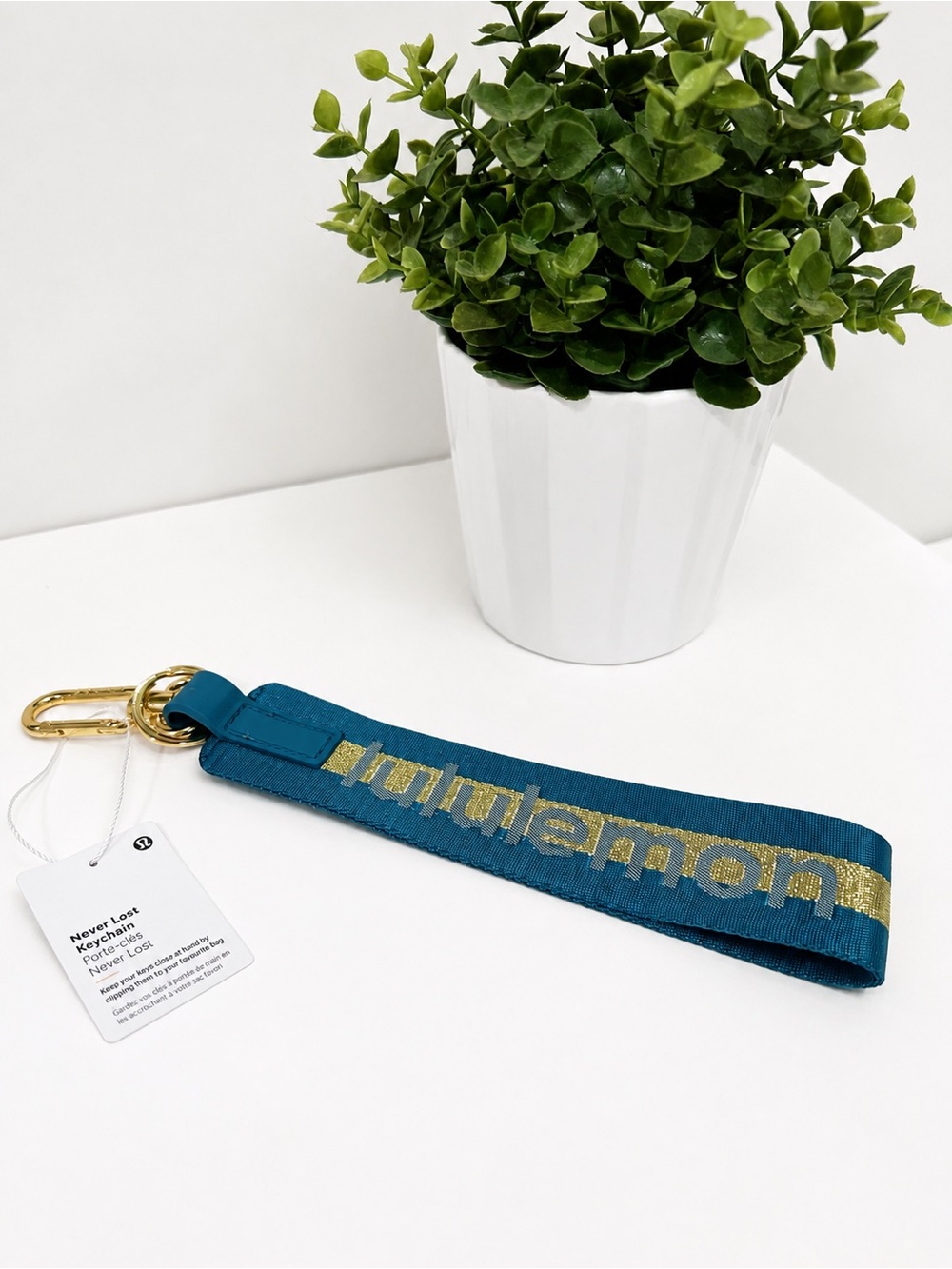lululemon athletica Teal and Gold Never Lost Keychain Wristlet